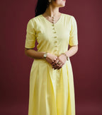 Golden Bloom Cotton Midi Dress – A Symphony of Elegance and Joy